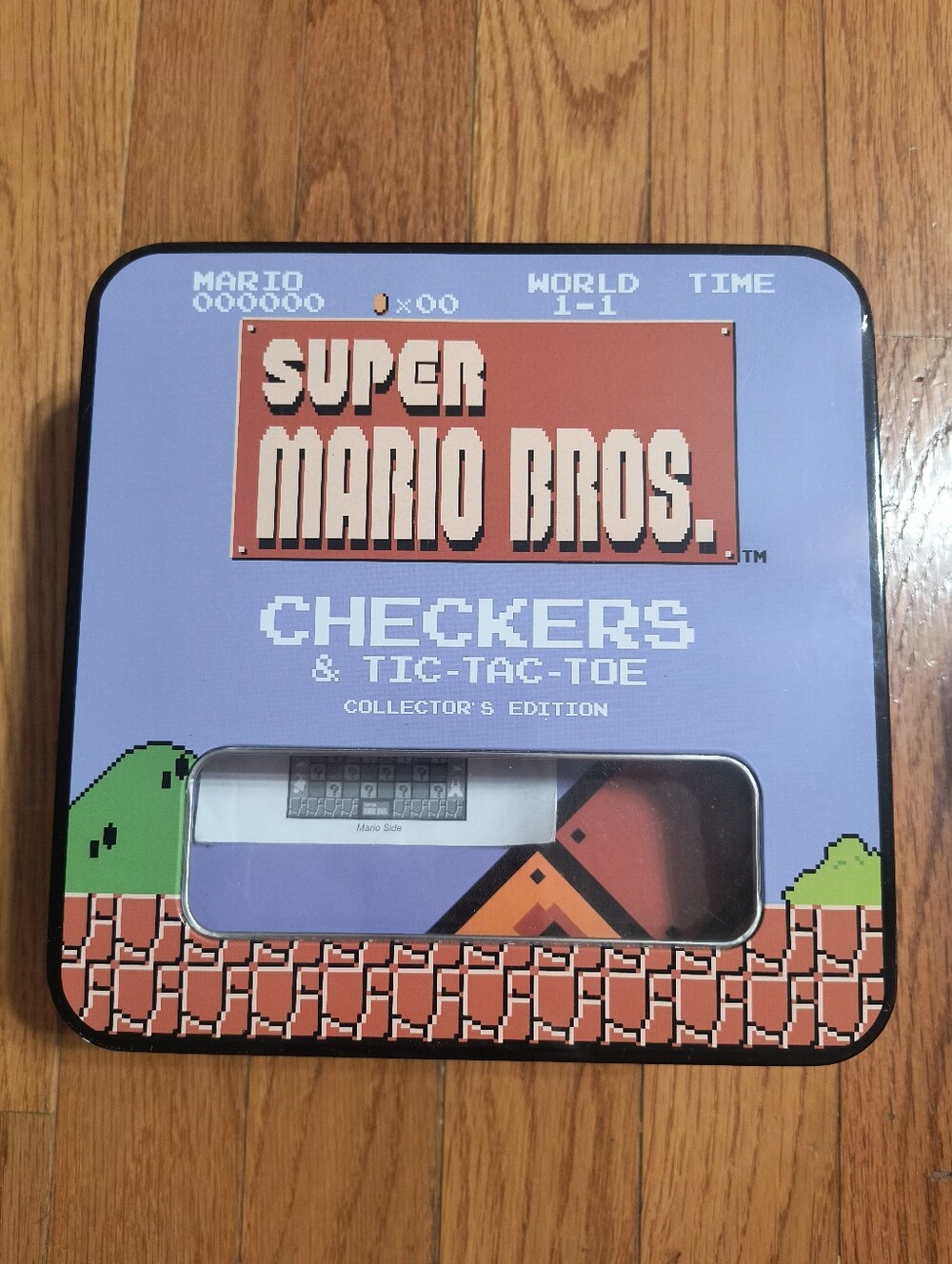 Super Mario Bros checkers and tic-tac-toe collector's edition tin and game